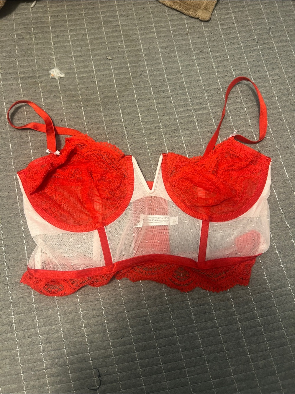 Red and pink sheer and lace bra